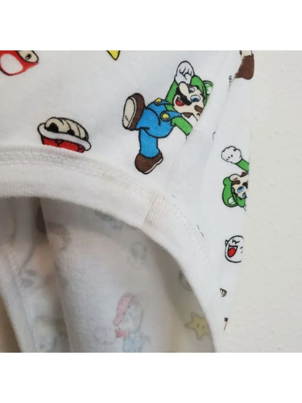 Super Mario Nintendo all-over-print baby onesie